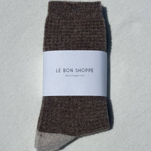 Load image into Gallery viewer, Brown sock with a white label on a light gray background
